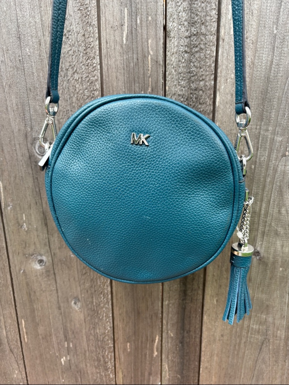 Michael Kors Teal Pebbled Leather Round Canteen Crossbody with Tassel